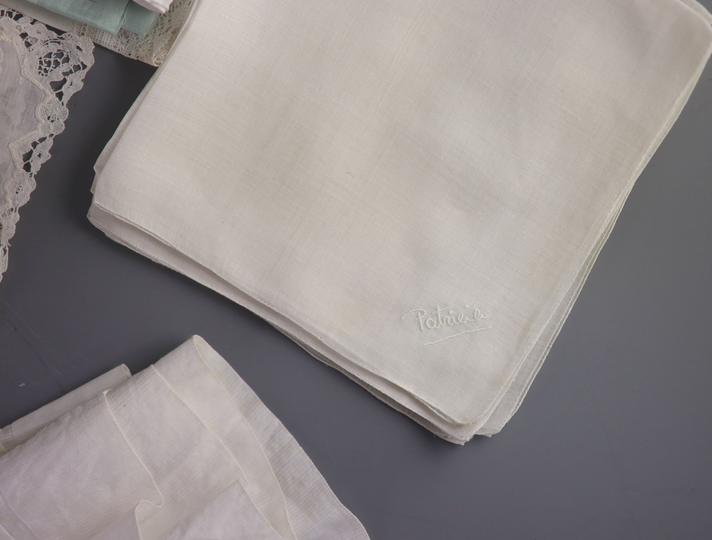 A silk coverlet embroidered 1701 with W initial as a centred cartouche,